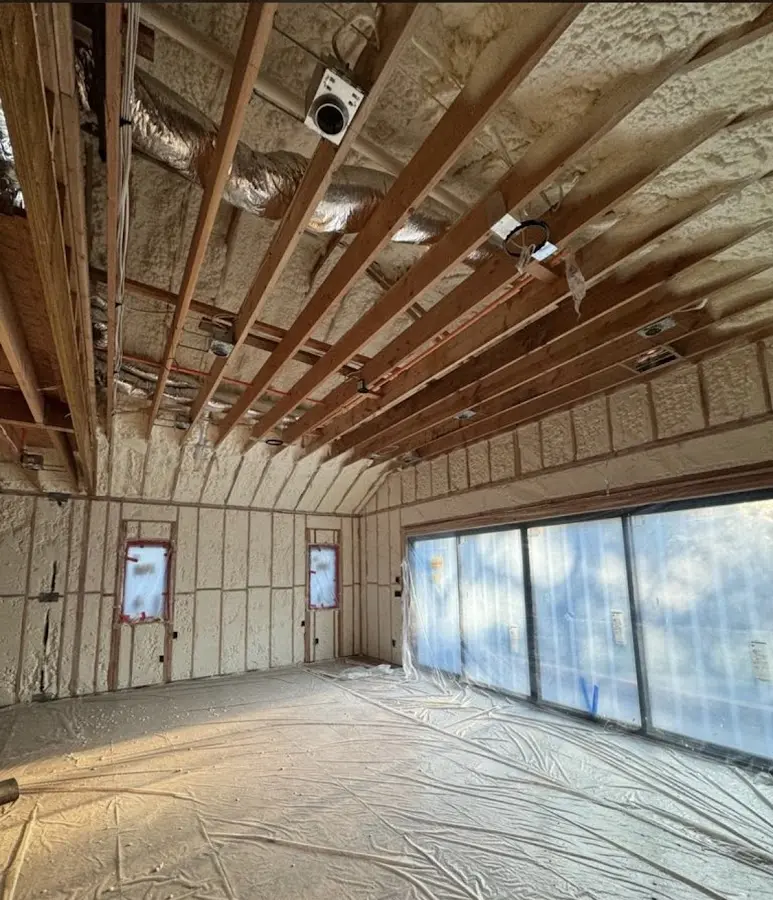 Interior walls and ceiling insulated with spray foam during new construction in Scottsburg